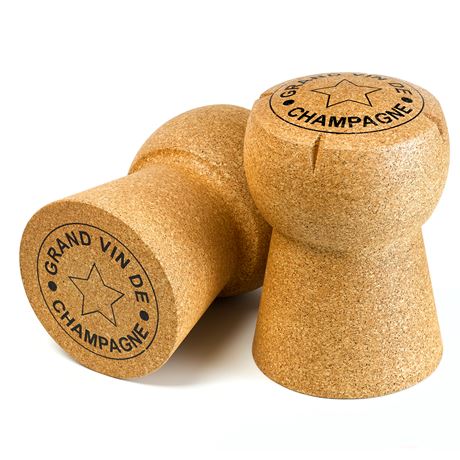 two giant champagne cork stools one on its side